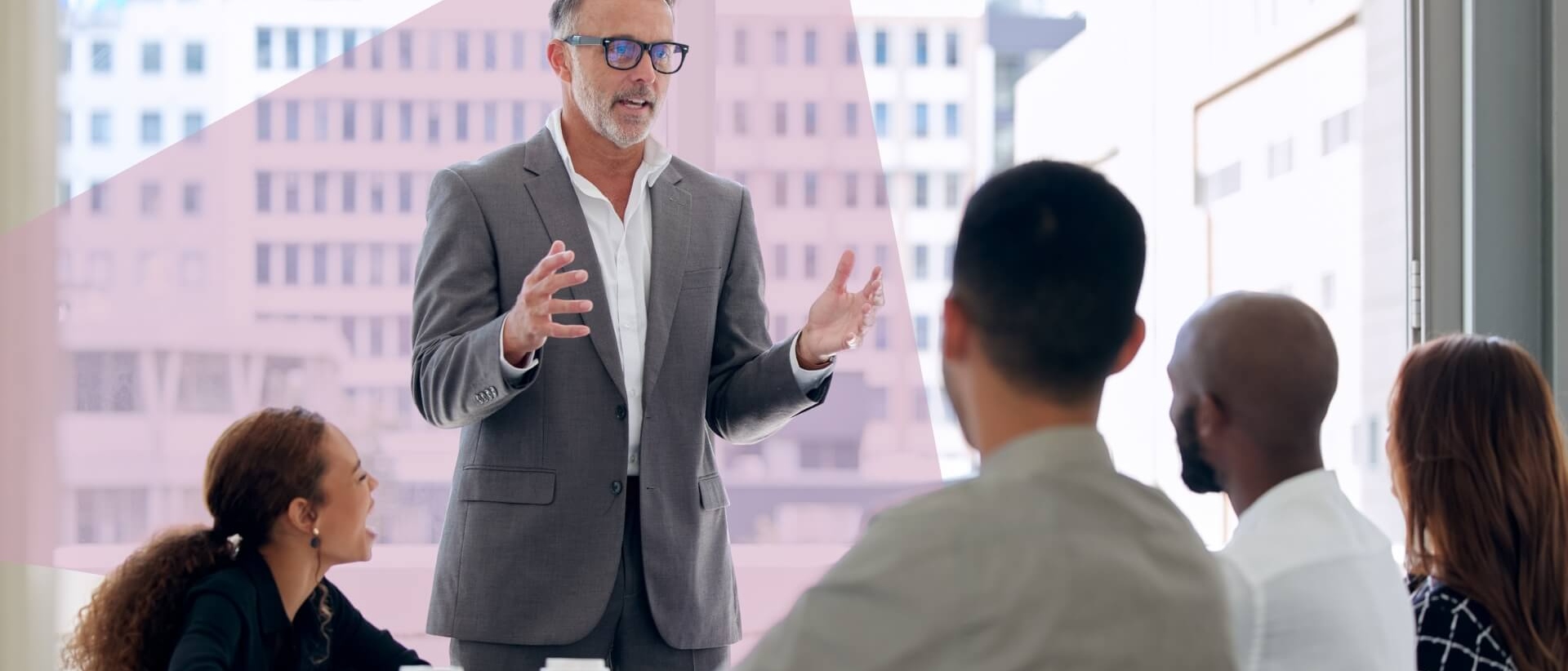 executives in board room making decisions