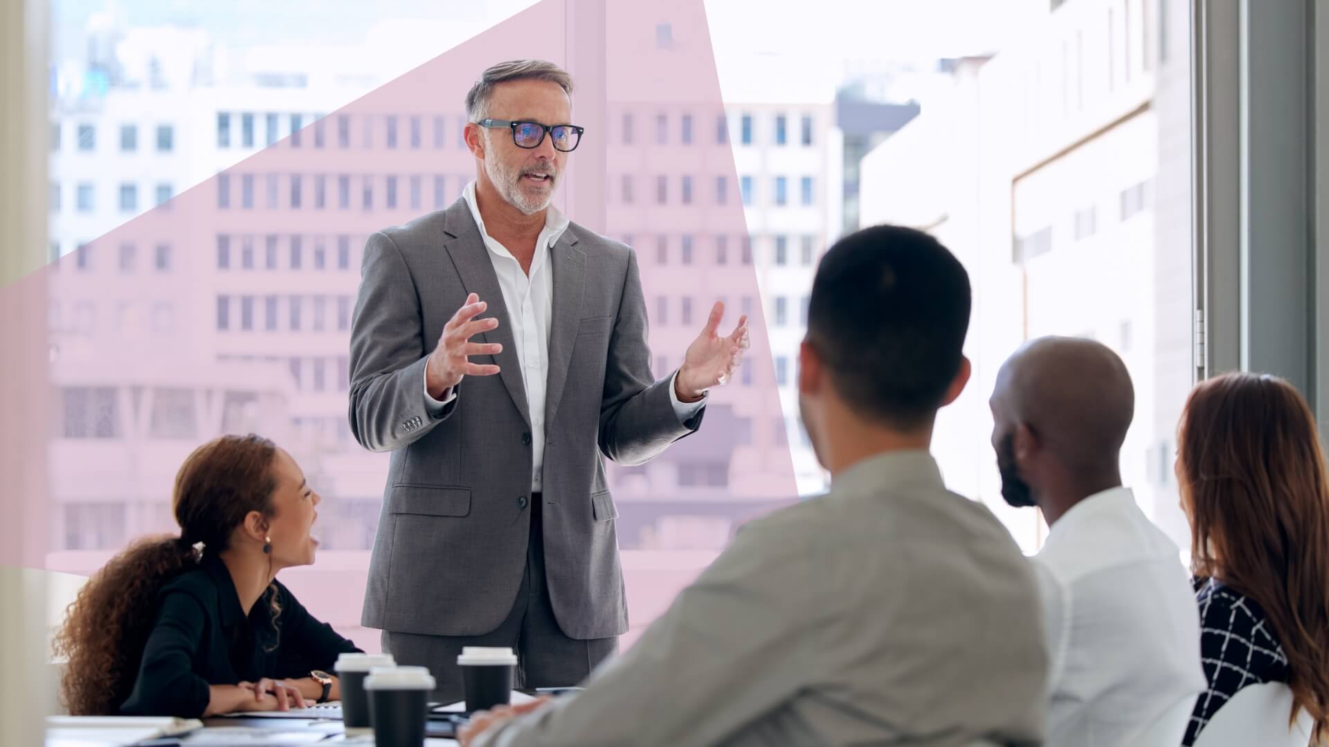 executives in board room making decisions