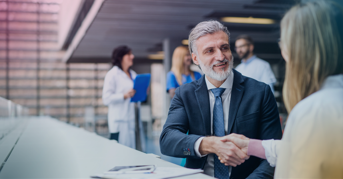 business man shaking hands with client