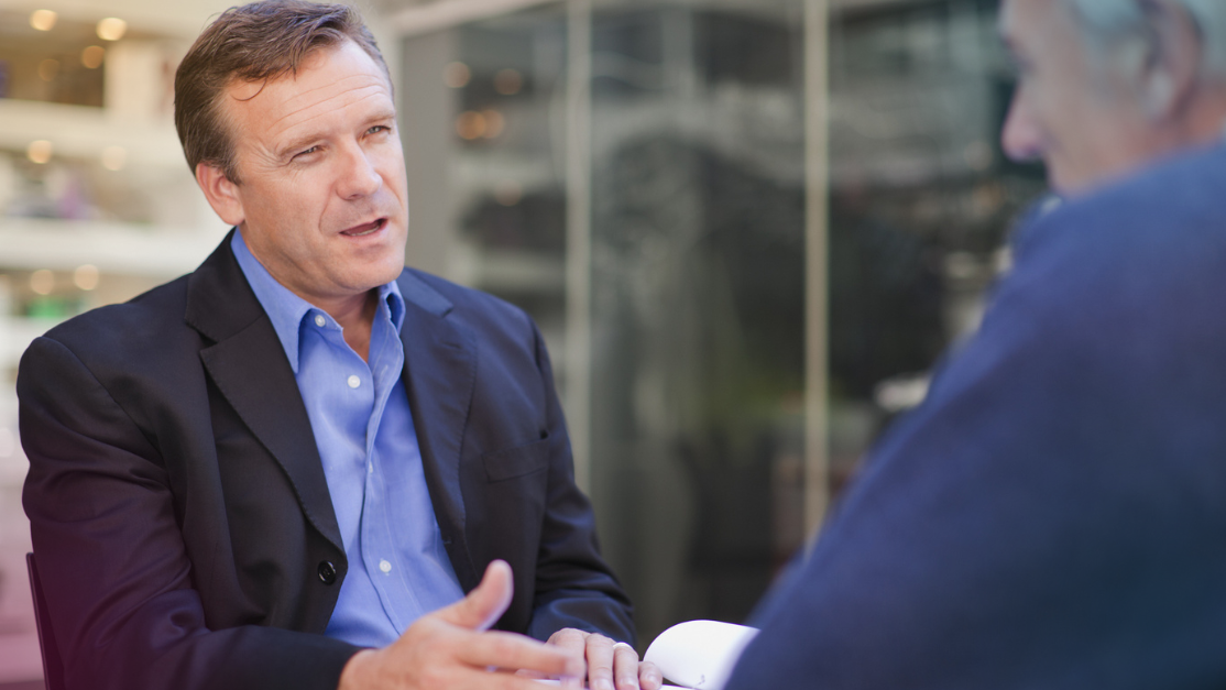 two business men having a casual conversation