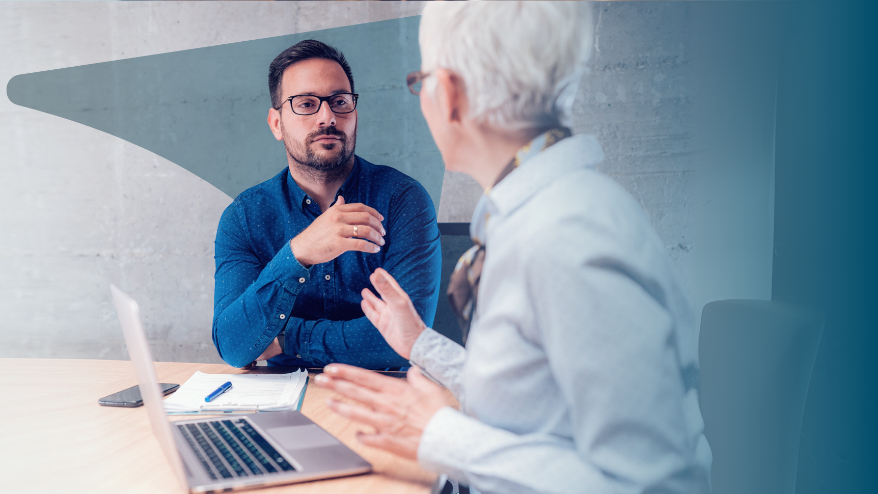 sales manager and her employee having a coaching conversation